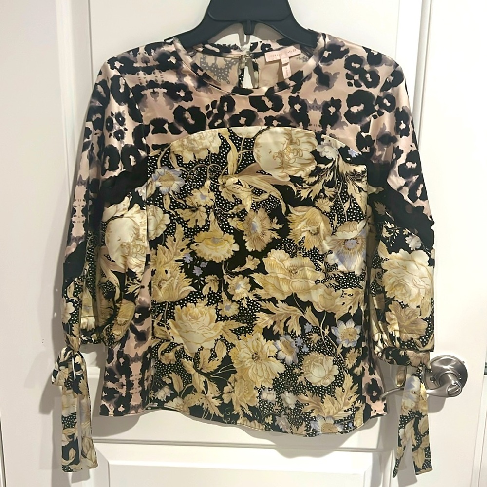 Rebecca Taylor silk blouse size 2 never been worn with black zig zag sleeves